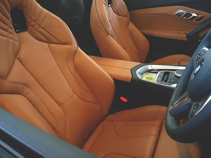 Car Seat Leather Repair in NYC - Tan leather car seat repair and upholstery service NYC