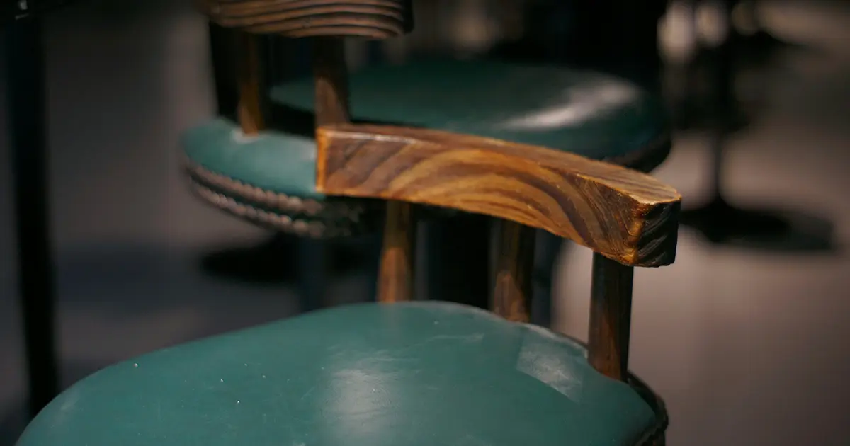 eco-friendly leather chair restoration in NYC - sustainable repair for worn furniture